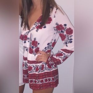 Floral boutique romper - size small